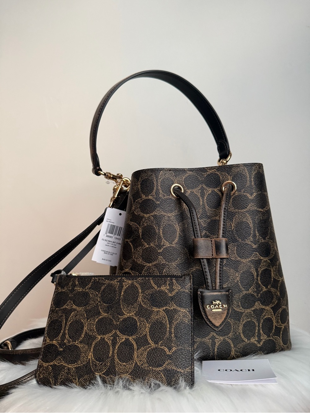 NWT COACH Rowan Bucket Bag In Loved Signature Canvas With Charms